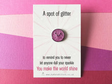 Load image into Gallery viewer, A mini round purple spot of glitter with a happy face, the backing card says never let anyone dull your sparkle, you make the world shine, mini enamel pin, cute happy positive gift