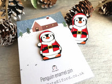 Load image into Gallery viewer, Christmas penguin enamel pin, Father Christmas on a snowy cottage backing card