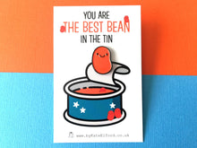 Load image into Gallery viewer, Best bean enamel pin, funny positive gift, mini pin on a backing card with the wording you are the best pin in the tin
