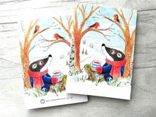 Load image into Gallery viewer, A badger and robins notebook. This shows that the front and back is the same design in reverse.