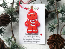 Load image into Gallery viewer, Christmas gift decorations. Red frosted acrylic penguin, snowman or gingerbread man. Cute Christmas tree ornaments. Sent on a cute gift card with the message wishing you love. and lots of good cheer, for a magical Christmas and a happy new year