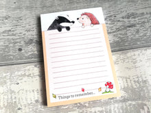 Load image into Gallery viewer, Hedgehog and badger lined notepad, A6 note pad, the wording at the bottom reads things to remember,  with a picture of a red toadstool and three leaves blowing in the wind