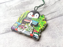 Load image into Gallery viewer, Penguin and house plants recycled acrylic hanger. Cute ornament. Reverse side