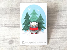 Load image into Gallery viewer, Cute polar bear wearing a red jumper and matching stripe socks enamel pin