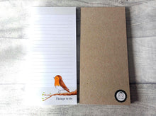 Load image into Gallery viewer, Robin shopping list tall thin notepad. There is a small watercolour robin and branch painting at the bottom with the words things to do. The notepad is white and beige, and lined with easy removable pages