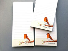 Load image into Gallery viewer, Three robin shopping list notepads. There is a small watercolour robin sat on a branch painting at the bottom with the words things to do. Every page has the same design. The notepad is lined with easy removable pages