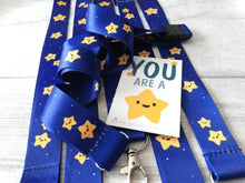 Load image into Gallery viewer, Gold star lanyards. Dark blue with yellow stars. You are a star quick release