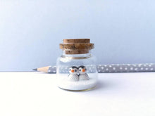 Load image into Gallery viewer, Miniature penguin Christmas decoration. Little pottery penguins in a glass bottle. Christmas, valentine penguin mini ornament