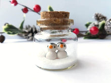 Load image into Gallery viewer, Miniature penguin Christmas decoration. Little pottery penguins in a glass bottle. Christmas, valentine penguin mini ornament