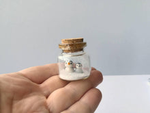 Load image into Gallery viewer, Miniature penguin Christmas decoration. Little pottery penguins in a glass bottle. Christmas, valentine penguin mini ornament