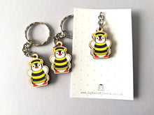 Load image into Gallery viewer, Tiny penguin bee keyring, mini penguin wooden key fob, ethically sourced wood, Boo the penguin dressed as a bee, eco friendly