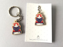 Load image into Gallery viewer, Mini guinea pig reading a book keyring, small wooden key fob, ethically sourced wood, guinea pig and books key chain, bag charm