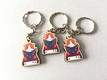 Load image into Gallery viewer, Mini guinea pig reading a book keyring, small wooden key fob, ethically sourced wood, guinea pig and books key chain, bag charm