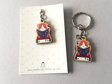 Load image into Gallery viewer, Mini guinea pig reading a book keyring, small wooden key fob, ethically sourced wood, guinea pig and books key chain, bag charm