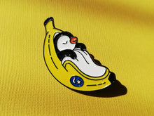 Load image into Gallery viewer, Penguin pin, penguin sleeping in a banana enamel pin, banana moon, fruit, food enamel badge