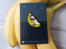 Load image into Gallery viewer, Penguin pin, penguin sleeping in a banana enamel pin, banana moon, fruit, food enamel badge
