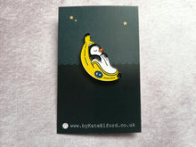 Load image into Gallery viewer, Penguin pin, penguin sleeping in a banana enamel pin, banana moon, fruit, food enamel badge