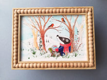 Load image into Gallery viewer, Badger and robins 7x5 inch unframed print. Badger is sat on the snow under a tree drinking a cup of tea
