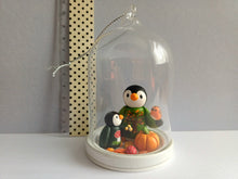 Load image into Gallery viewer, Penguins and robin glass dome