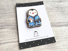 Load image into Gallery viewer, Little wooden penguin magnet having a cup of tea