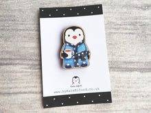 Load image into Gallery viewer, Little wooden penguin magnet having a cup of tea