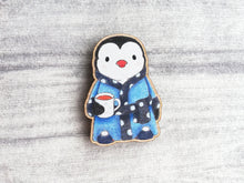 Load image into Gallery viewer, Little wooden penguin magnet having a cup of tea