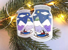 Load image into Gallery viewer, Cute Christmas penguin sledging hanger, lovely penguin ornament, unusual design, cute winter jam jar