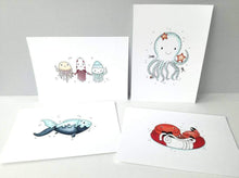 Load image into Gallery viewer, Set of four cute sea themed prints, jelly fish, octopus and starfish, crabs and a fish. Lovely nautical themed designs
