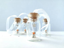 Load image into Gallery viewer, Miniature snowman decoration. Little pottery snowman in a glass bottle. Christmas mini ornament