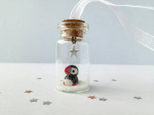 Load image into Gallery viewer, Puffin Christmas decoration. Little pottery puffin in a miniature glass bottle. Mini Christmas puffin ornament