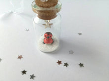 Load image into Gallery viewer, Robin Christmas decoration. Little pottery robin in a mini glass bottle. Miniature Christmas robin ornament