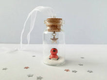 Load image into Gallery viewer, Robin Christmas decoration. Little pottery robin in a mini glass bottle. Miniature Christmas robin ornament