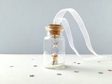 Load image into Gallery viewer, Miniature snowman decoration. Little pottery snowman in a glass bottle. Christmas mini ornament