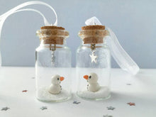 Load image into Gallery viewer, Miniature snowman decoration. Little pottery snowman in a glass bottle. Christmas mini ornament
