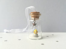 Load image into Gallery viewer, Cockatiel Christmas decoration. Little pottery cockatiel in a miniature glass bottle. Mini Christmas grey and yellow bird ornament