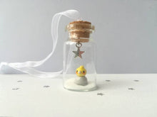 Load image into Gallery viewer, Cockatiel Christmas decoration. Little pottery cockatiel in a miniature glass bottle. Mini Christmas grey and yellow bird ornament
