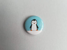 Load image into Gallery viewer, Penguin in the snow blue button badge
