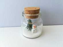 Load image into Gallery viewer, Miniature snowman Christmas decoration. Little pottery snowman and tree in a glass bottle. Christmas mini ornament