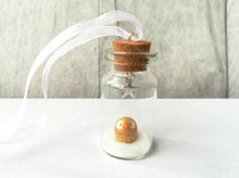Load image into Gallery viewer, Owl Christmas decoration. Little pottery owl in a miniature glass bottle. Mini Christmas owl ornament
