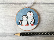 Load image into Gallery viewer, Penguin family decoration. Wooden Christmas ornament, penguins in the snow, eco friendly wood
