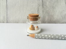 Load image into Gallery viewer, Miniature owl Christmas decoration. Little pottery owls in a glass bottle. Christmas owl mini ornament