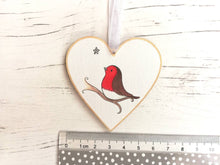 Load image into Gallery viewer, Robin memory heart. With you. Little robin ornament, with a silver glitter star, Made from responsibly resourced wood.