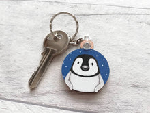 Load image into Gallery viewer, Penguin chick keyring. Wooden key fob, blue starry night, penguin key chain, wood bag charm, responsibly resourced wood