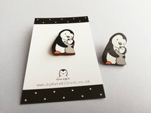 Load image into Gallery viewer, Penguin and chick wooden pin brooch, Mum and baby cute little penguin badge. Responsibly resourced wood.