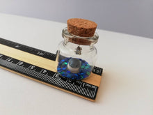 Load image into Gallery viewer, Miniature whale ornament. Little pottery whales in a glass bottle. Puffin mini ornament with or without hook