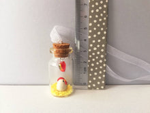 Load image into Gallery viewer, Miniature chicken and chick decoration. Little pottery white hen in a glass bottle. Mini ornament. Easter tree chick