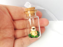 Load image into Gallery viewer, Miniature sloth ornament. Little pottery sloth decoration in a glass bottle. Christmas mini sloth ornament