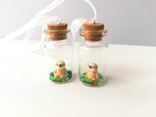 Load image into Gallery viewer, Miniature sloth ornament. Little pottery sloth decoration in a glass bottle. Christmas mini sloth ornament