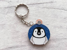 Load image into Gallery viewer, Penguin chick keyring. Wooden key fob, blue starry night, penguin key chain, wood bag charm, responsibly resourced wood