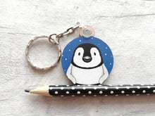 Load image into Gallery viewer, Penguin chick keyring. Wooden key fob, blue starry night, penguin key chain, wood bag charm, responsibly resourced wood